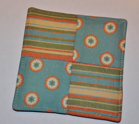 Finished coaster shown with top stitching 1/8" from edge