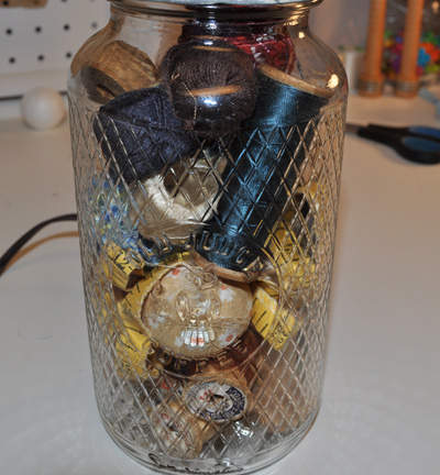 Vintage Sewing Accessories In Glass Jar